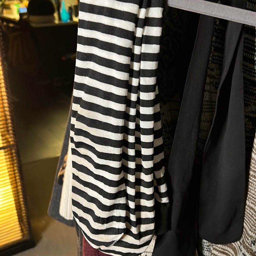 black and white stripped tall socks gently used